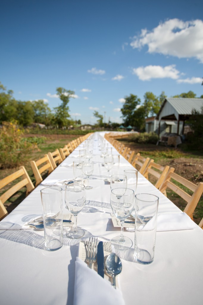 An outdoor table for a meal at a wedding, catered by Cote Catering in Austin Texas.