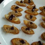 Rabbit pate with blackberry jam on crostini